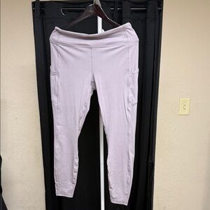 Light Purple Leggings side pockets 1x waist 17. Has lots of stretch
